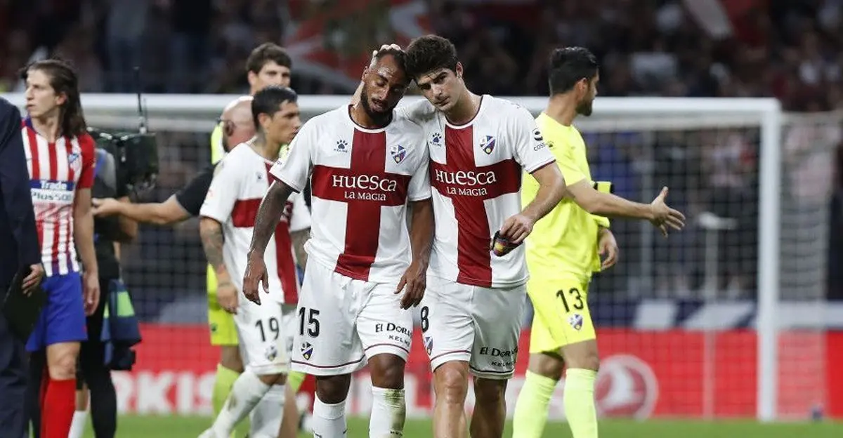 Akapo y Melero, dos s&iacute;mbolos del Huesca, que la pr&oacute;xima temporada defender&aacute;n otros escudos. | Foto: LFP
