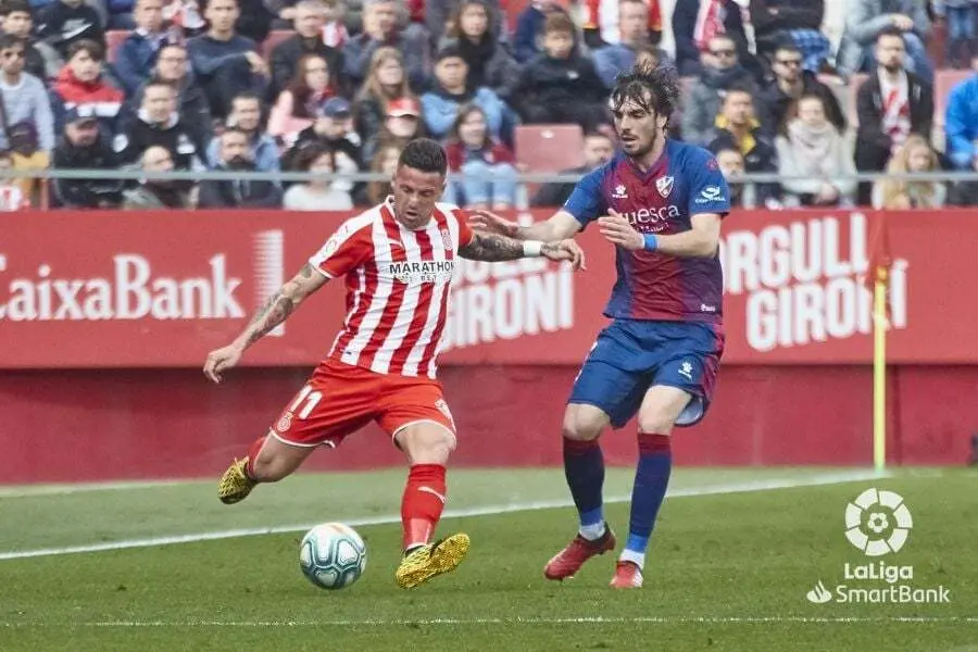 Eugeni presiona en el encuentro ante el Girona en Montilivi. | Foto: LaLiga