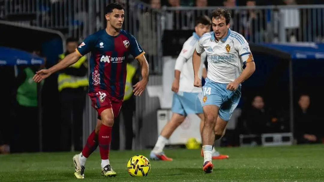 Jes&uacute;s &Aacute;lvarez y Francho Serrano en el derbi aragon&eacute;s / Marcos Cebri&aacute;n
