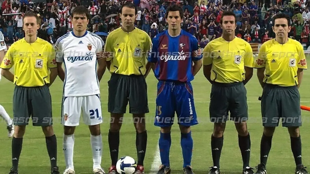 Joaqu&iacute;n Sorribas y Zapater, capitanes de ambos conjuntos | Foto: sporthuesca.com - C.Pascual