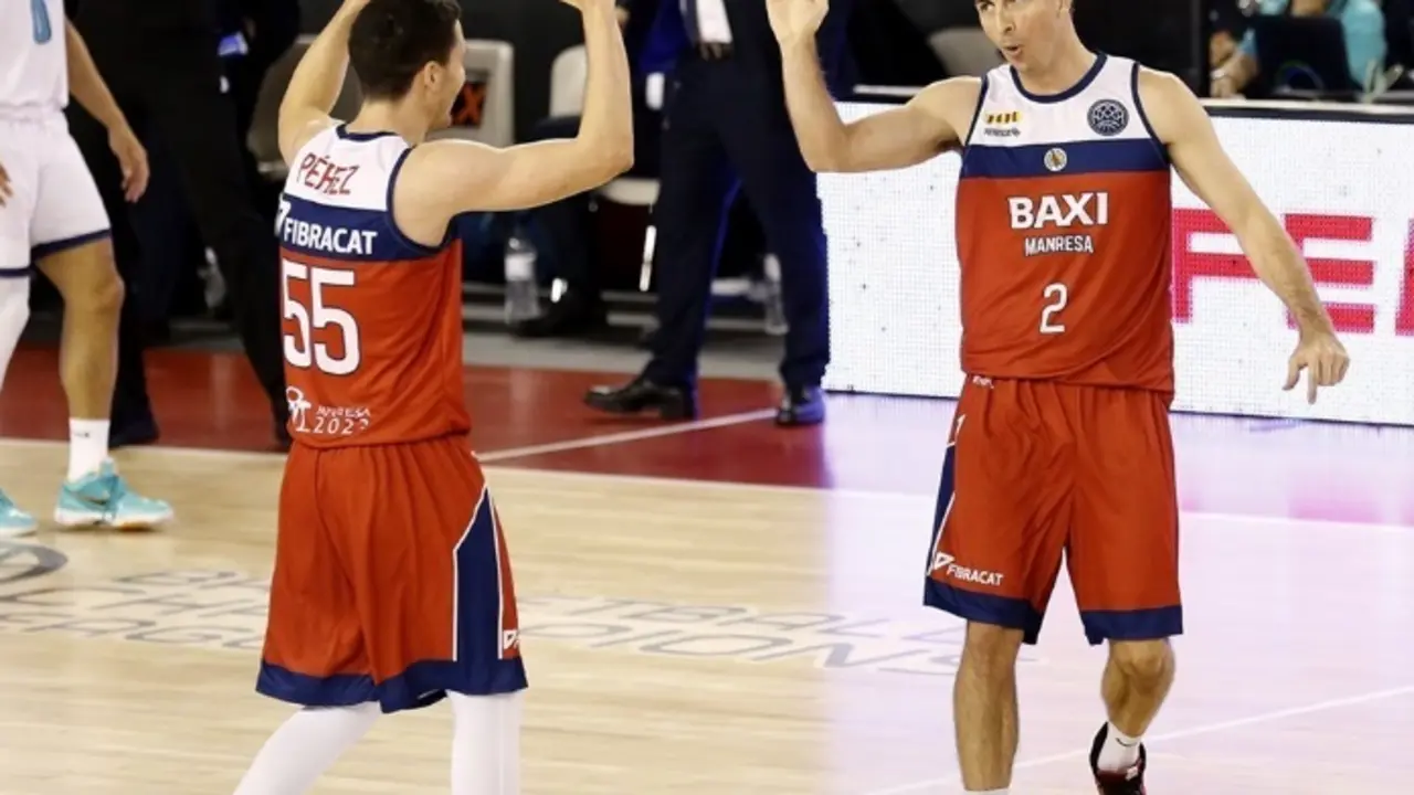 Dani P&eacute;rez y Ryan Toolson celebran una acci&oacute;n de los catalanes. Foto: FIBA