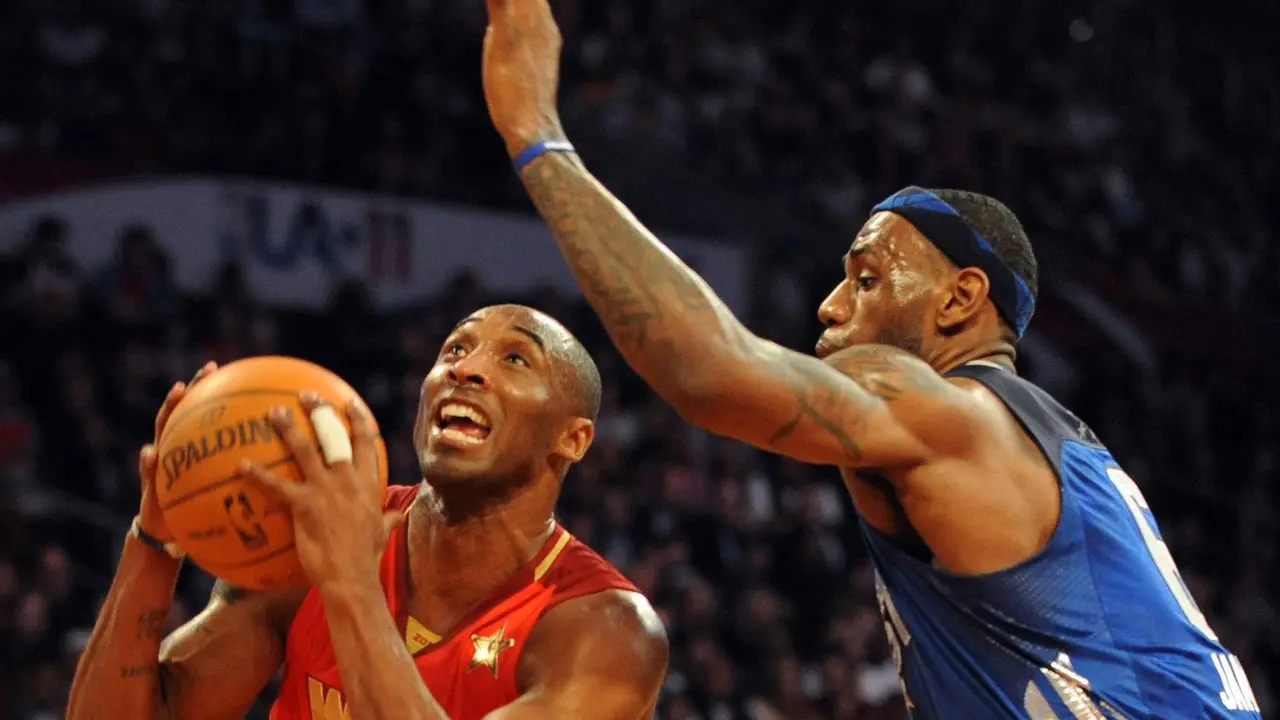 Kobe Bryant (L) of the L.A. Lakers playing for the West team, gets past East Team's LeBron James of the Miami Heat during the All-Stars Game at the Staples Center in Los Angeles on February 20, 2011. The game won by the West team 148-143 is the 60th NBA All-Star Game showdown between the Eastern and Western conference superstars.        AFP PHOTO/Mark RALSTON (Photo credit should read MARK RALSTON/AFP via Getty Images)
