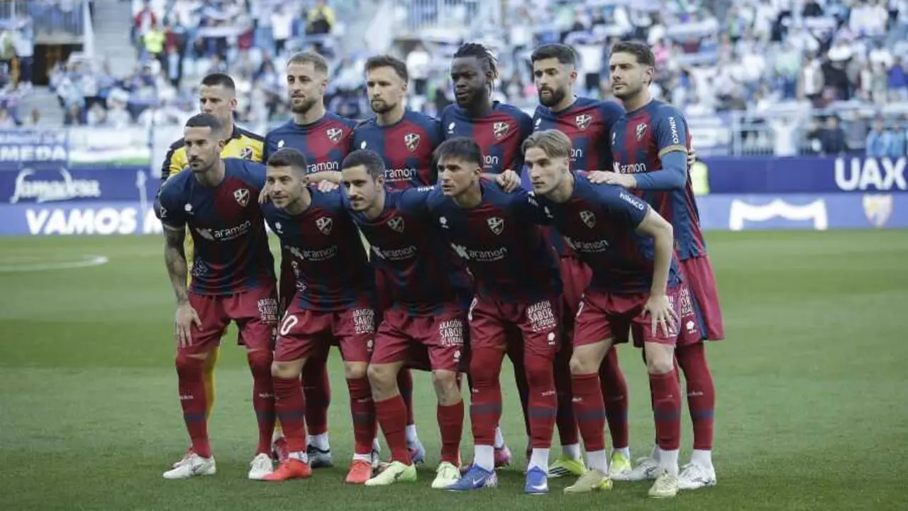 Once del Huesca en M&aacute;laga. | Foto: LaLiga