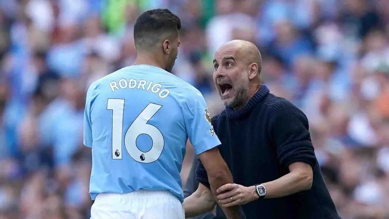 Rodri con Guardiola / EUROPA PRESS