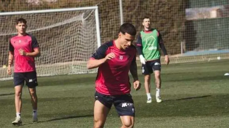 Seoane, Jordi y Ro en el entrenamiento / SD Huesca